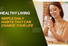 Woman holding a glass, promoting health.