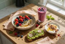 Healthy quick breakfast recipes with overnight oats, smoothie, avocado toast, and yogurt on a table